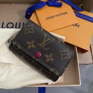 Louis Vuitton Brown Monogram 6 key holder Fushia pink inside and button.